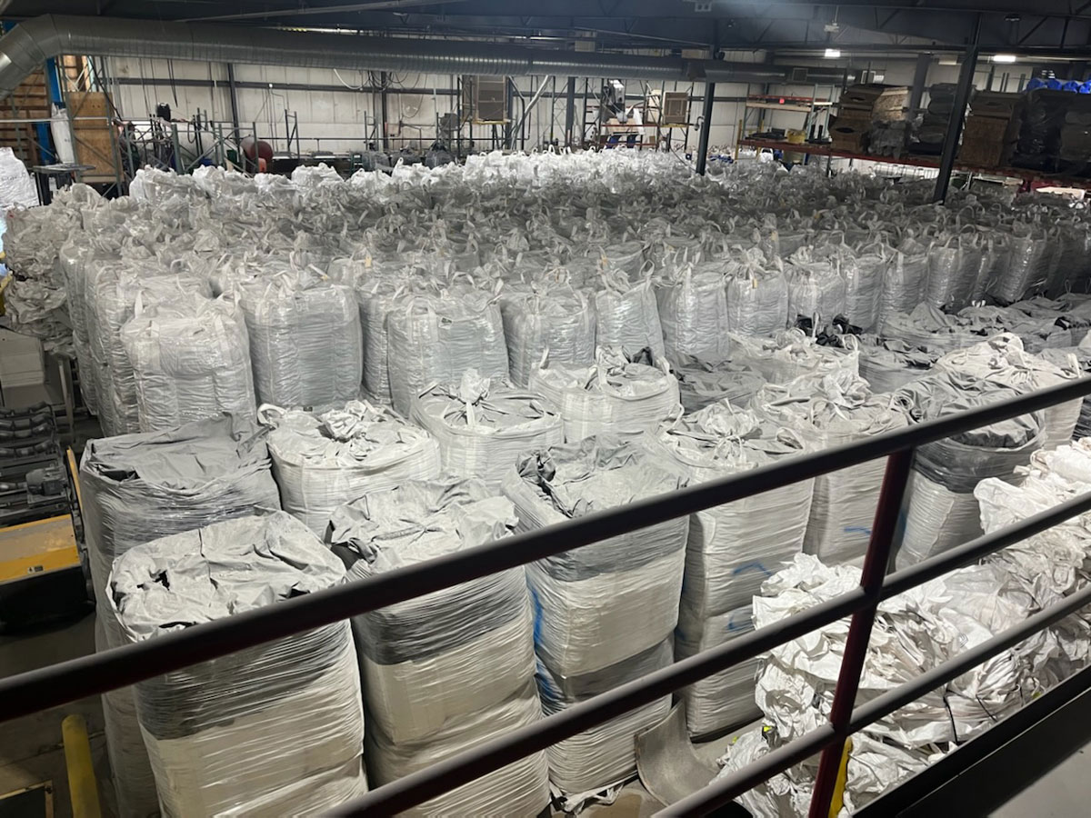 Hundreds of 50-cubic-foot super sacks of Enhanced Cell-Max in our warehouse