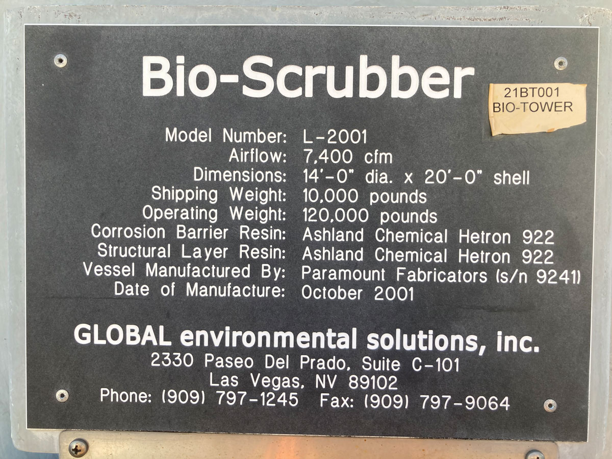 Plaque listing Bio-Scrubber's installation date and original specs